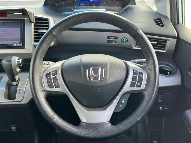 ホンダ フリード ハイブリット ジャストセレクション 新潟県 2014(平26)年 7.2万km プレミアムブルーオパールメタリック 社外ナビ【フルセグTV/FM・AM/BT】/バックカメラ/クルーズコントロール/両側パワースライドドア/ETC/ドライブレコーダー/ハーフレザーシート/3列シート/革巻きステアリング/ステアリングスイッチ/LEDヘッドライト/スマートキー/スペアキー/純正アルミホイール/純正フロアマット