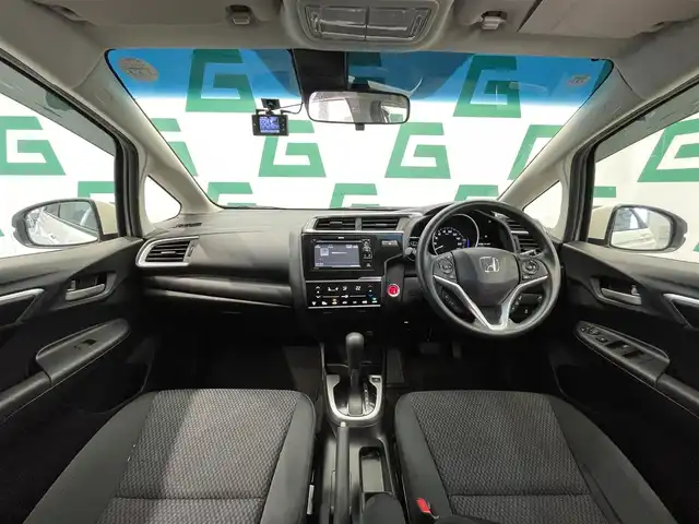 ホンダ フィット 13G L ホンダセンシング 鹿児島県 2018(平30)年 6.2万km プラチナホワイトパール 禁煙　/ホンダセンシング　/○衝突軽減ブレーキ　/○誤発進抑制機能　/○車線維持支援システム/○先行車発進お知らせ機能/○標識認識機能/ディスプレイオーディオ　/バックカメラ　/追従型クルーズコントロール　/前後ドライブレコーダー　/純正ドアバイザー　/純正フロアマット　/ＥＴＣ　/ＬＥＤヘッドライト/オートライト