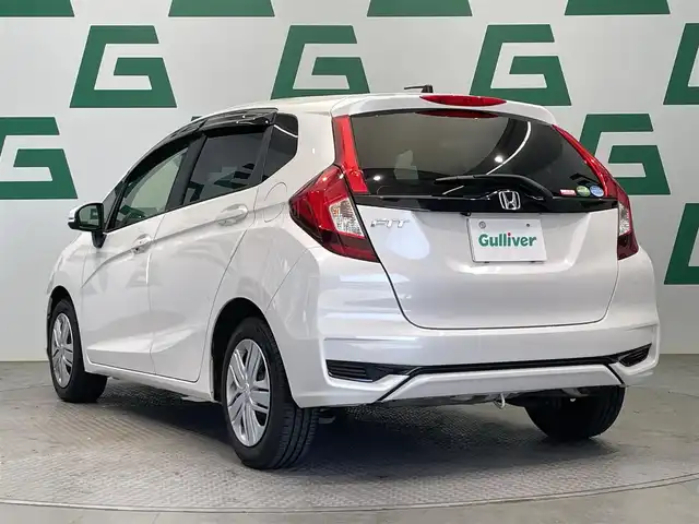 ホンダ フィット 13G L ホンダセンシング 鹿児島県 2018(平30)年 6.2万km プラチナホワイトパール 禁煙　/ホンダセンシング　/○衝突軽減ブレーキ　/○誤発進抑制機能　/○車線維持支援システム/○先行車発進お知らせ機能/○標識認識機能/ディスプレイオーディオ　/バックカメラ　/追従型クルーズコントロール　/前後ドライブレコーダー　/純正ドアバイザー　/純正フロアマット　/ＥＴＣ　/ＬＥＤヘッドライト/オートライト