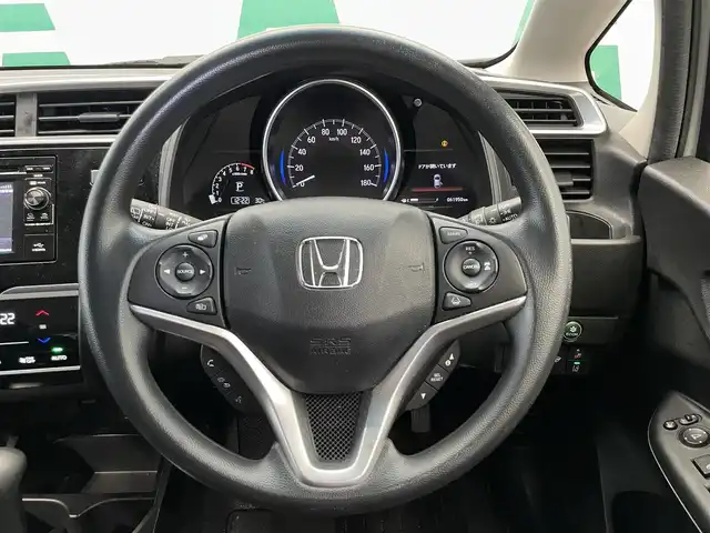 ホンダ フィット 13G L ホンダセンシング 鹿児島県 2018(平30)年 6.2万km プラチナホワイトパール 禁煙　/ホンダセンシング　/○衝突軽減ブレーキ　/○誤発進抑制機能　/○車線維持支援システム/○先行車発進お知らせ機能/○標識認識機能/ディスプレイオーディオ　/バックカメラ　/追従型クルーズコントロール　/前後ドライブレコーダー　/純正ドアバイザー　/純正フロアマット　/ＥＴＣ　/ＬＥＤヘッドライト/オートライト