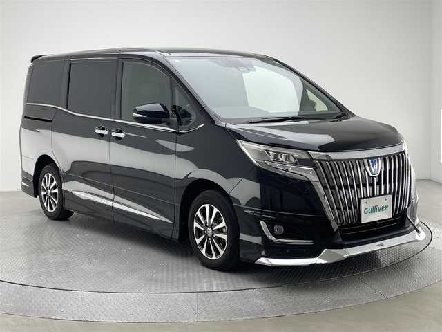 トヨタ エスクァイア ハイブリッド Gi 兵庫県 2021(令3)年 3.3万km ブラック ワンオーナー/ALPINE11インチナビ/フルセグ CD DVD BT MSV/ALPINEフリップダウンモニター/クルーズコントロール/PCS/LDA/クリアランスソナー/ALPINEETC2.0/ALPINEナビ連動ドライブレコーダー/モデリスタエアロ/バックカメラ/レザーシート/シートヒーター/LEDヘッドライト/LEDフォグライト/オートライト/オートハイビーム/MOPセンターコンソール/MOPスペアタイヤ/AC100V電源/社外ステアリング/スマートキー/スペアキー