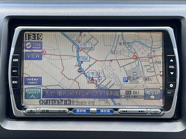 ホンダ ステップワゴン 三重県 2012(平24)年 11.3万km プレミアムホワイトパール 福祉車両/助手席回転シート/純正ナビ/バックカメラ/純正フリップダウンモニター/両側パワースライドドア/HIDヘッドライト/オートライト/フォグライト/純正ホイールキャップ/電動格納ミラー/禁煙車