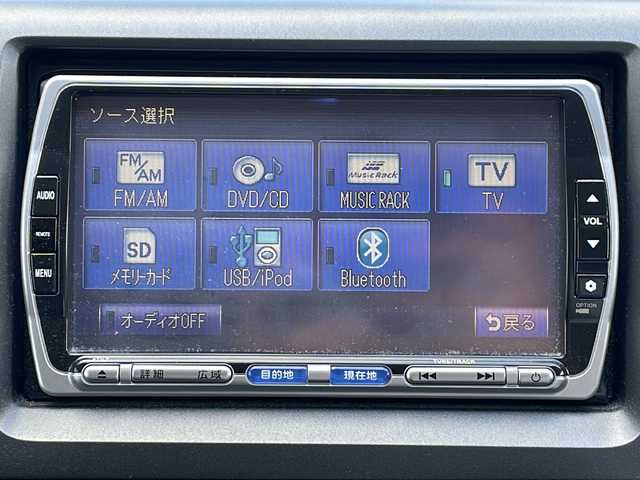 ホンダ ステップワゴン 三重県 2012(平24)年 11.3万km プレミアムホワイトパール 福祉車両/助手席回転シート/純正ナビ/バックカメラ/純正フリップダウンモニター/両側パワースライドドア/HIDヘッドライト/オートライト/フォグライト/純正ホイールキャップ/電動格納ミラー/禁煙車