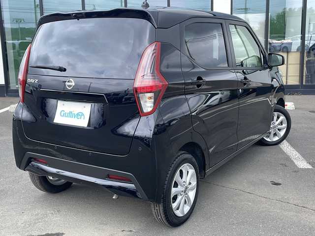 日産 デイズ X 道東・釧路十勝 2023(令5)年 1万km ブラック ・４WD/・社外SDメモリナビ/（CD・DVD・BT・AM・FM・フルセグ）/・バックカメラ/・ETC/・前後コーナーセンサー/・衝突被害軽減ブレーキ/・アイドリングストップ/・クリアランスソナー/・スマートキー/・プッシュスタート/・前席シートヒーター/・横滑り防止装置/・社外フロアマット/・純正14インチアルミホイール