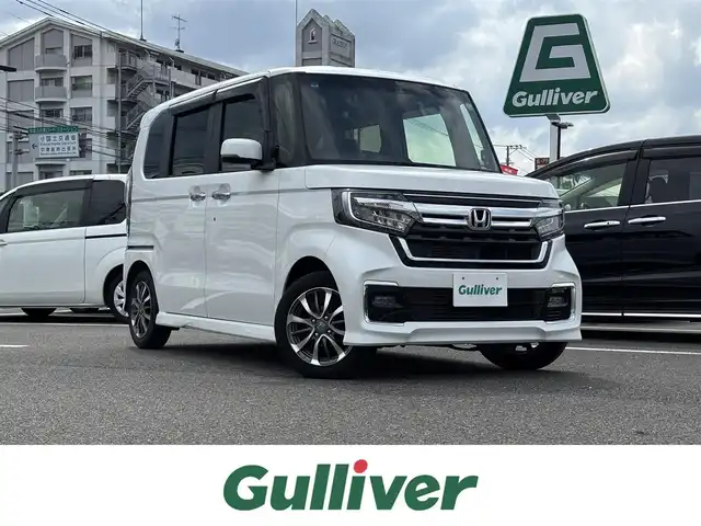 ホンダ Ｎ ＢＯＸ カスタム L 大分県 2021(令3)年 5.9万km プラチナホワイトパール ・社外ナビ(CD/DVD/BT/SD)/・バックカメラ/・フルセグテレビ/・衝突軽減ブレーキ/・コーナーセンサー/・片側パワースライドドア/・レーダークルーズコントロール/・ドライブレコーダー/・ETC/・ステアリングリモコン/・オートハイビーム/・シートヒーター/・スマートキー/・純正ホイール
