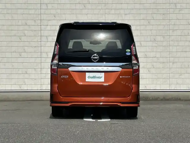 日産 セレナ e－パワー ハイウェイスター V 福岡県 2020(令2)年 2.1万km サンライズオレンジ/ダイヤモンドブラック 純正10型SDナビ（フルセグTV/CD/DVD/BT）アラウンドビューモニターフリップダウンモニタークルコンエマージェンシーブレーキコーナーセンサーBSM両側パワスラドラレコETCUSBポート純正LEDヘッドライト純正15インチアルミホイールスマートキープッシュスタート