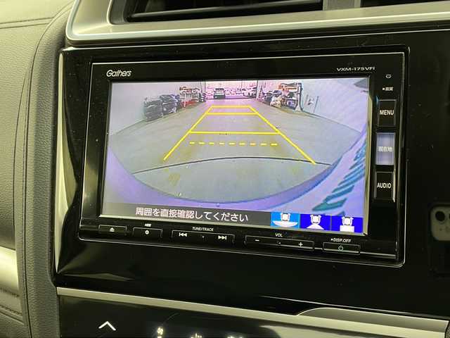 ホンダ フィット ハイブリット Fパッケージ コンフォートED 栃木県 2016(平28)年 6.1万km アラバスターシルバーメタリック 禁煙車/純正メモリーナビ/・AM/FM/CD/DVD/フルセグ/BT/SD/iPod/バックカメラ/前席シートヒーター/ビルトインETC/LEDヘッドライト/電動格納ミラー/純正マット/スマートキー×２/純正15インチスチールホイール/新車保証書
