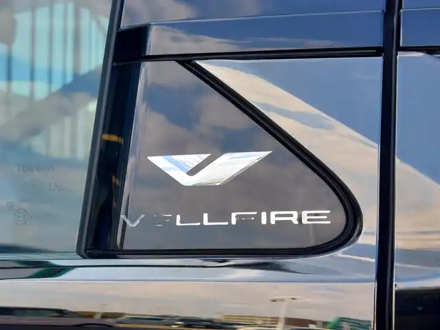 トヨタ ヴェルファイア ハイブリット Z プレミア 東京都 2024(令6)年 2.9万km 黒 左右独立ムーンルーフ/モデリスタエアロ/トヨタチームメイト/・アドバンストパーク/・パーキングサポートブレーキ（周辺静止物）/・アドバンストドライブ/・緊急時操舵支援/・フロントクロストラフィックアラート/・レーンチェンジアシスト/・ドライバーモニターカメラ/セーフティセンス/・プリクラッシュセーフティ/・レーントレーシングアシスト/・全車速追従機能付レーダークルーズコントロール/・アダプティブハイビームシステム/・ロードサインアシスト/・ドライバー異常時対応システム/・プロアクティブドライビングアシスト/・発進遅れ告知機能/BSM/パーキングサポートブレーキ/12インチフリップダウンモニター/14インチディスプレイオーディオ/・車載ナビ/・地デジTV/・USB/HDMI/・AppleCarPlay/AndroidAuto/・ETC2.0/床下透過表示機能付パノラミックビューモニター/ヘッドアップディスプレイ/ドライブレコーダー/両側パワースライドドア/パワーバックドア/本革シート/シートヒーター/ベンチレーション/ステアリングヒーター