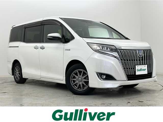 トヨタ エスクァイア ハイブリッド Gi プレミアムパッケージ 宮城県 2017(平29)年 11.8万km ホワイトパールクリスタルシャイン 禁煙車/フリップダウンモニター/トヨタセーフティセンス/・プリクラッシュセーフティ/・レーンディパーチャーアラート/・オートマチックハイビーム/・レーダークルーズコントロール/純正9インチSDナビ/・BT/AM/FM/CD/SD/フルセグTV /バックカメラ/両側パワースライドドア/前席シートヒーター/ビルトインETC/革巻きステアリング/ステアリングヒーター/プッシュスタート/スマートキー×2/LEDヘッドライト/LEDフォグランプ/社外15インチアルミホイール/積み込み純正アルミホイール付き夏タイヤ/（195/65R15）/純正フロアマット/純正ドアバイザー