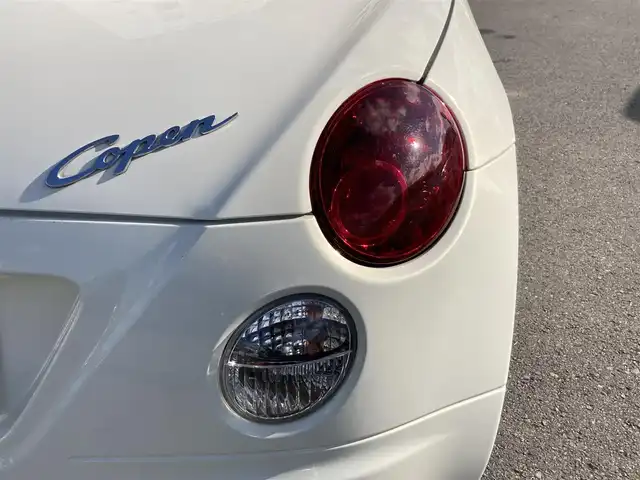 ダイハツ コペン アクティブトップ 静岡県 2010(平22)年 7.5万km ホワイトパールマイカ 社外6.1インチナビ(MDV-L300)/　AM FM CD DVD USB SD AUX ワンセグ/マニュアルエアコン/ハロゲンヘッドライト/フロントフォグランプ/リモコンキー/純正フロアマット/保証書/アクティブトップ(電動開閉ルーフ)/社外15インチアルミホイール/ターボ