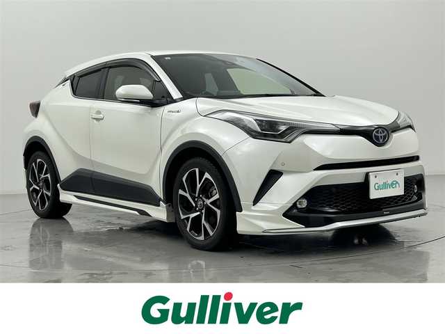 トヨタ Ｃ－ＨＲ G 熊本県 2019(令1)年 6.7万km ホワイトパールクリスタルシャイン 純正ナビ/バックカメラ/ビルトインETC/モデリスタエアロ/トヨタセーフティセンス/・プリクラッシュセーフティ/・レーダークルーズコントロール/・レーンキープアシスト/・オートマチックハイビーム/電動パーキングブレーキ/ブレーキホールド/ブラインドスポットモニター/LEDヘッドライト/ハーフレザーシート/シートヒーター/スペアキー