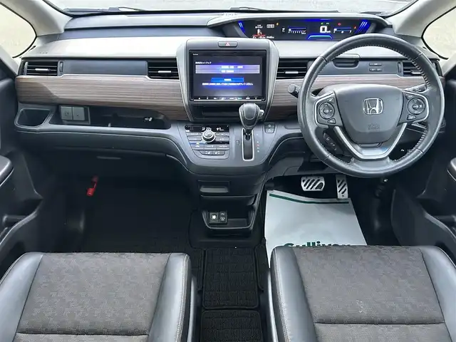 ホンダ フリード クロスター 兵庫県 2023(令5)年 1.7万km フィヨルドミストパール 純正9インチナビ/両側電動スライドドア/バックカメラ/Bluetooth/前席シートヒーター/前後ドライブレコーダー/ハーフレザーシート/ビルトインETC/LEDヘッドライト/スペアキー/追従クルーズコントロール/純正フロアマット/フルセグTV/ウォークスルー