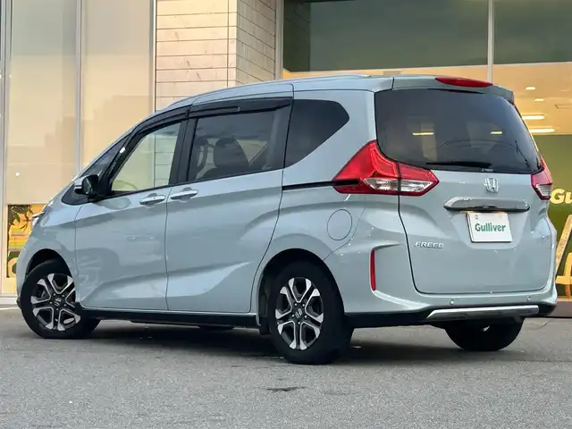 ホンダ フリード クロスター 兵庫県 2023(令5)年 1.7万km フィヨルドミストパール 純正9インチナビ/両側電動スライドドア/バックカメラ/Bluetooth/前席シートヒーター/前後ドライブレコーダー/ハーフレザーシート/ビルトインETC/LEDヘッドライト/スペアキー/追従クルーズコントロール/純正フロアマット/フルセグTV/ウォークスルー