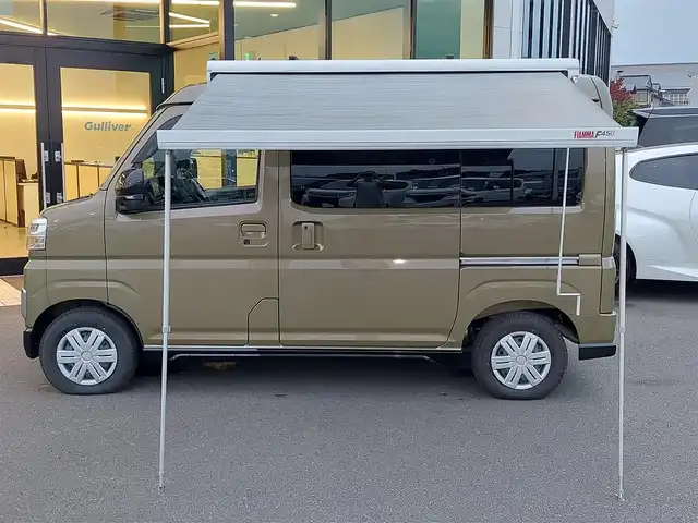 ダイハツ アトレー バン RS 東京都 2022(令4)年 0.1千km オフビートカーキM キャンピング仕様/家具・水道・給排水タンク/外部電源/ベットキット/タープテント付/純正ディスプレイオーディオ/AppleCarplay/androidauto/バックカメラ/両側パワースライド/前後ドライブレコーダー/ビルトインＥＴＣ/ラバーマット/LEDヘッドライト/フォグ/ルーフキャリア