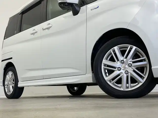 スズキ ソリオ HV MZ 新潟県 2021(令3)年 6万km ピュアホワイトP 純正メモリナビ/（BT/FM/AM/フルセグTV/DVD)/全周囲カメラ/衝突軽減ブレーキ/レーダークルーズコントロール/ステアリングスイッチ/シートヒーター/両側パワースライド/ヘッドアップディスプレイ/純正15インチアルミホイール/純正フロアマット/純正オートヘッドライト/電格ミラー/サンシェード/ETC