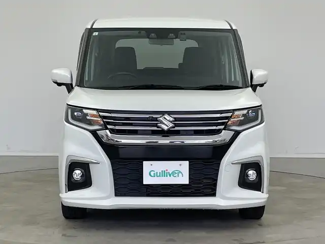 スズキ ソリオ HV MZ 新潟県 2021(令3)年 6万km ピュアホワイトP 純正メモリナビ/（BT/FM/AM/フルセグTV/DVD)/全周囲カメラ/衝突軽減ブレーキ/レーダークルーズコントロール/ステアリングスイッチ/シートヒーター/両側パワースライド/ヘッドアップディスプレイ/純正15インチアルミホイール/純正フロアマット/純正オートヘッドライト/電格ミラー/サンシェード/ETC