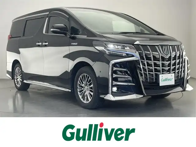 トヨタ アルファードハイブリット エグゼクティブ ラウンジ S 愛知県 2020(令2)年 4.8万km ブラック メーカーナビ/ムーンツインルーフ/JBLプレミアムサウンド/リヤエンターテイメント/HDMI/AC100V電源/ワイヤレス充電/アラウンドビューモニター/ブラインドスポットモニター/デジタルインナーミラー/パーキングアシスト/ベンチレーション/黒レザーシート/トヨタセーフティセンス/パワーバックドア/ステアリングヒーター/ナノイー/Miracast/両側パワースライドドア/パワーシート/LEDオートライト/フォグランプ/純正アルミホイール/フルセグTV/DVD/ETC2.0/前後ドライブレコーダー/純正フロアマット/衝突被害軽減ブレーキ/カーテンエアバック/コーナーセンサー/禁煙車