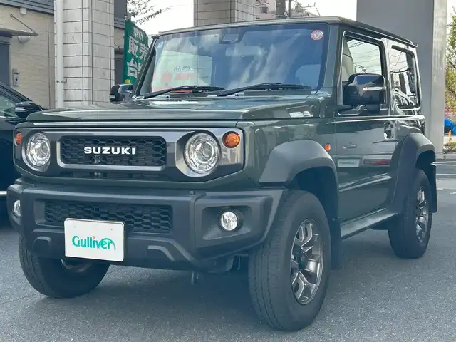 スズキ ジムニー シエラ JC 愛知県 2024(令6)年 4.6万km ジャングルグリーン ワンオーナー/純正SDナビ〈SKX-S808〉/DVD／Bluetooth／地デジTV/バックカメラ/前席シートヒーター/LEDヘッドライト/フロントフォグランプ/アイドリングストップ/ビルトインETC/純正15インチAW/ヘッドライトウォッシャー/スマートキー＆プッシュスタート/スズキセーフティサポート/・前方衝突被害軽減ブレーキアシスト/・デュアルセンサーブレーキサポート/・誤発信抑制機能/・車線逸脱警報/・ふらつき警報/・標識認識機能/・ハイビームアシスト