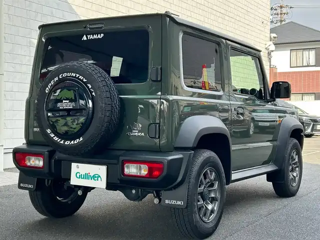 スズキ ジムニー シエラ JC 愛知県 2024(令6)年 4.6万km ジャングルグリーン ワンオーナー/純正SDナビ〈SKX-S808〉/DVD／Bluetooth／地デジTV/バックカメラ/前席シートヒーター/LEDヘッドライト/フロントフォグランプ/アイドリングストップ/ビルトインETC/純正15インチAW/ヘッドライトウォッシャー/スマートキー＆プッシュスタート/スズキセーフティサポート/・前方衝突被害軽減ブレーキアシスト/・デュアルセンサーブレーキサポート/・誤発信抑制機能/・車線逸脱警報/・ふらつき警報/・標識認識機能/・ハイビームアシスト