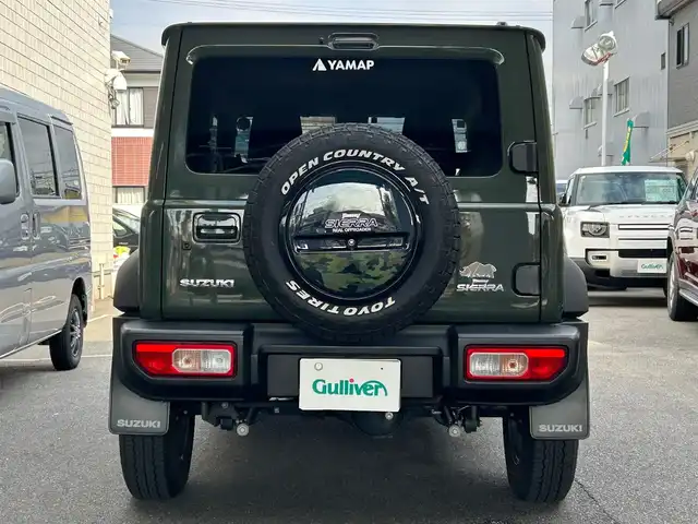 スズキ ジムニー シエラ JC 愛知県 2024(令6)年 4.6万km ジャングルグリーン ワンオーナー/純正SDナビ〈SKX-S808〉/DVD／Bluetooth／地デジTV/バックカメラ/前席シートヒーター/LEDヘッドライト/フロントフォグランプ/アイドリングストップ/ビルトインETC/純正15インチAW/ヘッドライトウォッシャー/スマートキー＆プッシュスタート/スズキセーフティサポート/・前方衝突被害軽減ブレーキアシスト/・デュアルセンサーブレーキサポート/・誤発信抑制機能/・車線逸脱警報/・ふらつき警報/・標識認識機能/・ハイビームアシスト
