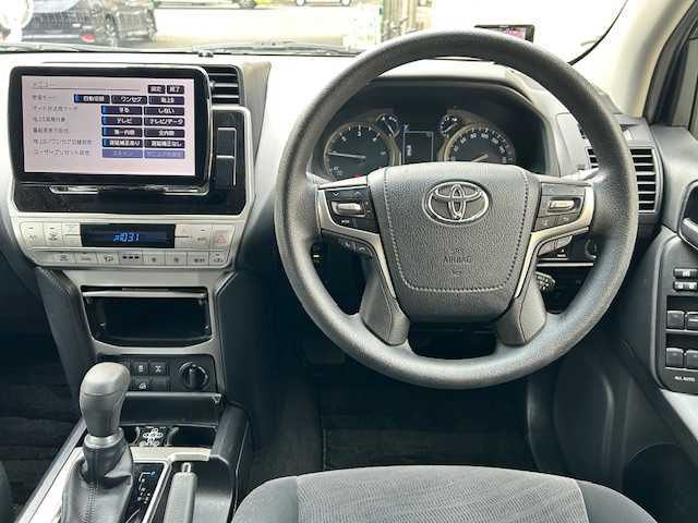 トヨタ ランドクルーザー プラド TX 東京都 2018(平30)年 2.5万km ホワイトパールクリスタルシャイン ワンオーナー/社外ナビ　CN-F1XD/　＜フルセグTV/DVD/Blu-ray/CD/Bluetooth/SD＞/バックカメラ/ETC/レーダークルーズ/レーンディパーチャーアラート/プリクラッシュセーフティ/コーナーセンサー/社外レーダー/ルーフレール/スタッドレスタイヤ4本車載/純正フロアマット/ドアバイザー/スペアキー/取扱説明書/保証書