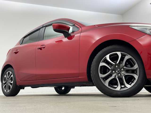 マツダ デミオ XD ツーリング 新潟県 2016(平28)年 5万km ソウルレッドプレミアムメタリック マツダコネクトナビ/　フルセグTV/Bluetooth/CD/DVD/衝突被害軽減ブレーキ/クルーズコントロール/前席シートヒーター/前後ドライブレコーダー/バックモニター/ビルトインETC/LEDヘッドライト/アイドリングストップ/横滑り防止装置/パドルシフト/レザーステアリング/ステアリングスイッチ/オートライト/純正16インチアルミホイール/スマートキー/純正フロアマット