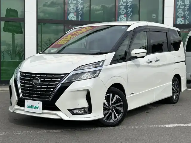 日産 セレナ ハイウェイスター V 和歌山県 2020(令2)年 1.8万km ブリリアントホワイトパール 純正9インチナビ/Bluetooth/フルセグＴＶ/アラウンドビューモニター/ステアリングスイッチ/プロパイロット/両側パワースライドドア/前後ドライブレコーダー/パーキングアシスト/ブラインドスポットモニター/ＥＴＣ２．０/ＬＥＤヘッドライト/フォグランプ/エマージェンシーブレーキ/踏み間違い防止装置/LEDライト/フォグランプ/レーンキープアシスト/マット・バイザー/純正16インチアルミホイール/横滑り防止装置