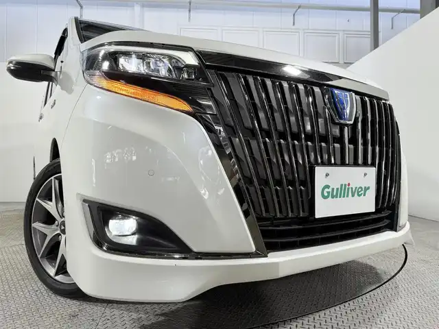 トヨタ エスクァイア ハイブリッド Gi プレミアムパッケージ ブラックテーラード 大阪府 2019(令1)年 4.1万km ホワイトパールクリスタルシャイン 純正大型ナビＴＶ　クルコン　シートヒーター　ハンドルヒーター　バックカメラ　衝突軽減　両側パワスラ　ＥＴＣ　ドラレコ　レーンアシスト　スマートキー　ＬＥＤヘッドライト　オートマチックハイビーム