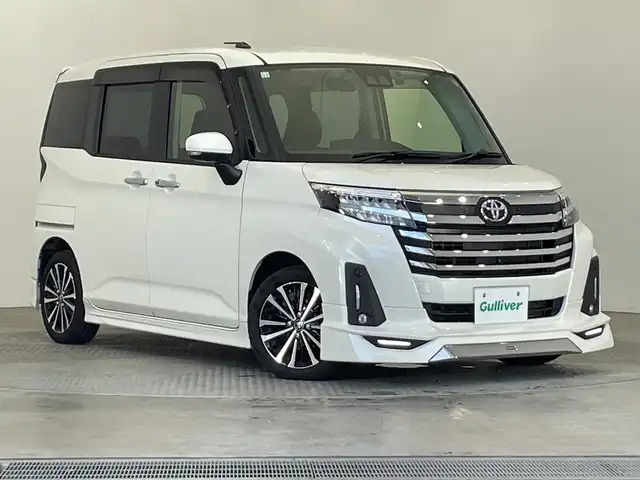 トヨタ ルーミー カスタムG－T 栃木県 2020(令2)年 2.9万km パールホワイトⅢ ターボ/純正ナビ/(CD/DVD/フルセグTV/Bluetooth/MSV)/全方位カメラ/モデリスタフルエアロ/スマートアシスト/・衝突回避支援ブレーキ機能/・誤発進抑制制御機能/・先行車発進お知らせ機能/・車線逸脱警報機能/・全車速追従機能付きACC/・オートマチックハイビーム/前後コーナーセンサー/ビルトインETC2.0/前方ドラレコ/両側パワースライドドア/シートヒーター/禁煙車/オートライト/LEDヘッドライト/横滑り防止装置/フォグランプ/スマートキー/プッシュスタート/アイドリングストップ/ステアリングスイッチ/革巻きステアリング/ウィンカーミラー/電動格納ミラー/純正15インチアルミホイール/純正フロアマット