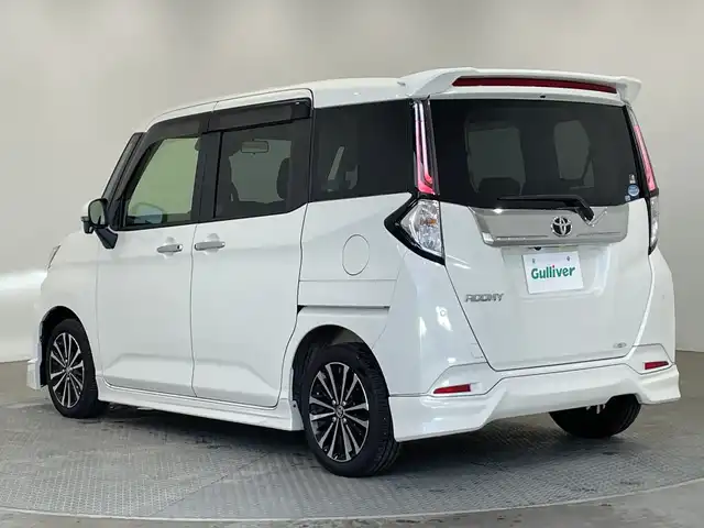 トヨタ ルーミー カスタムG－T 栃木県 2020(令2)年 2.9万km パールホワイトⅢ ターボ/純正ナビ/(CD/DVD/フルセグTV/Bluetooth/MSV)/全方位カメラ/モデリスタフルエアロ/スマートアシスト/・衝突回避支援ブレーキ機能/・誤発進抑制制御機能/・先行車発進お知らせ機能/・車線逸脱警報機能/・全車速追従機能付きACC/・オートマチックハイビーム/前後コーナーセンサー/ビルトインETC2.0/前方ドラレコ/両側パワースライドドア/シートヒーター/禁煙車/オートライト/LEDヘッドライト/横滑り防止装置/フォグランプ/スマートキー/プッシュスタート/アイドリングストップ/ステアリングスイッチ/革巻きステアリング/ウィンカーミラー/電動格納ミラー/純正15インチアルミホイール/純正フロアマット