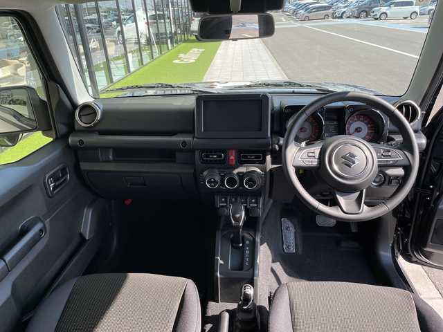 スズキ ジムニー ノマド FC 愛知県 2025(令7)年 0.1千km 黒 登録済未使用車/スズキセーフティサポート/レーダークルーズコントロール/シートヒーター/コーナーセンサー/純正アルミホイール/４ＷＤ/LEDヘッドライト/レーンキープアシスト/ダウンヒルアシストコントロール/オートマチックハイビーム/衝突軽減システム/ステアリングスイッチ/スマートキー/プッシュスタート