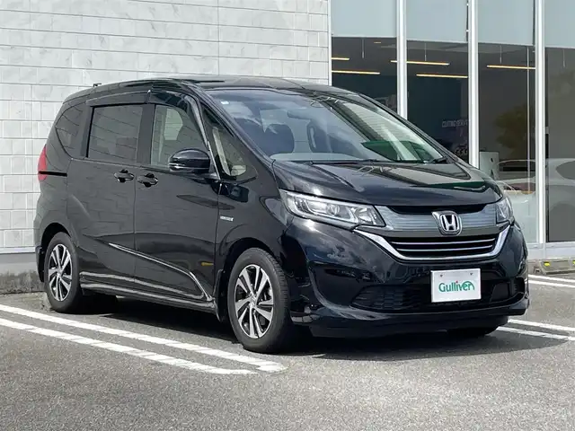ホンダ フリード ハイブリット G ホンダセンシング 宮崎県 2016(平28)年 12.7万km クリスタルブラックパール ワンオーナー/純正ナビ【VXM-175VFi】/・フルセグTV・Bluetooth・DVD・CD/両側パワースライドドア/バックカメラ/ビルトインETC/衝突軽減ブレーキ/LEDヘッドライト/レーダークルーズコントロール/スマートキー・スペアキー有り/純正フロアマット/純正ドアバイザー/純正15インチホイール