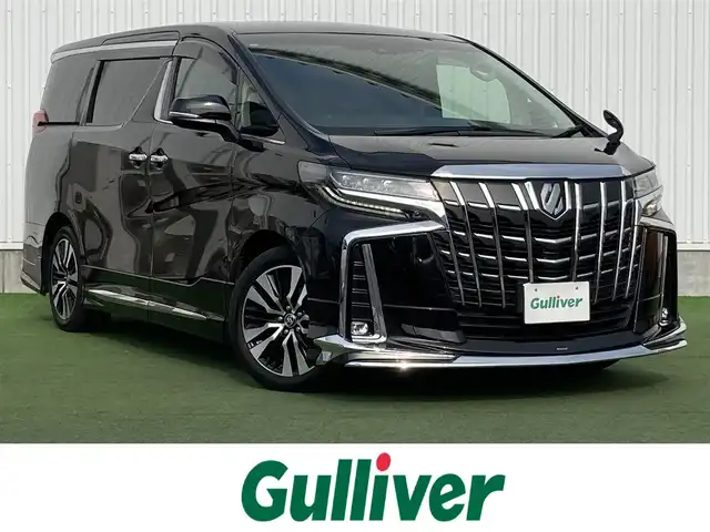 トヨタ アルファード S Cパッケージ 香川県 2020(令2)年 5.6万km ブラック 登録時走行距離：55455km/モデリスタエアロ/メーカー純正ナビ/　CD DVD BT フルセグTV/純正フリップダウンモニター（V12T-R68C）/バックカメラ/両側パワースライドドア/パワーバックドア/プリクラッシュセーフティシステム/レーンキープアシスト/レーダークルーズコントロール/クリアランスソナー/ブラインドスポットモニター/オートハイビーム/LEDヘッドライト/オートライト/フォグランプ/ブラックレザーシート/シートベンチレーション/オットマン/ロールサンシェード/前後ドライブレコーダー/ビルトインETC/デジタルインナーミラー/AC100V充電/木目革巻きコンビステアリング/ステアリングスイッチ/プッシュスタート/スマートキー