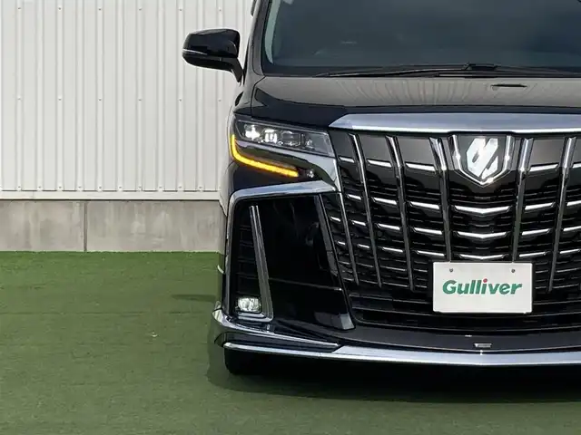 トヨタ アルファード S Cパッケージ 香川県 2020(令2)年 5.6万km ブラック 登録時走行距離：55455km/モデリスタエアロ/メーカー純正ナビ/　CD DVD BT フルセグTV/純正フリップダウンモニター（V12T-R68C）/バックカメラ/両側パワースライドドア/パワーバックドア/プリクラッシュセーフティシステム/レーンキープアシスト/レーダークルーズコントロール/クリアランスソナー/ブラインドスポットモニター/オートハイビーム/LEDヘッドライト/オートライト/フォグランプ/ブラックレザーシート/シートベンチレーション/オットマン/ロールサンシェード/前後ドライブレコーダー/ビルトインETC/デジタルインナーミラー/AC100V充電/木目革巻きコンビステアリング/ステアリングスイッチ/プッシュスタート/スマートキー