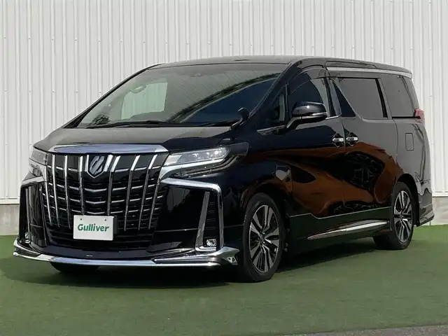 トヨタ アルファード S Cパッケージ 香川県 2020(令2)年 5.6万km ブラック 登録時走行距離：55455km/モデリスタエアロ/メーカー純正ナビ/　CD DVD BT フルセグTV/純正フリップダウンモニター（V12T-R68C）/バックカメラ/両側パワースライドドア/パワーバックドア/プリクラッシュセーフティシステム/レーンキープアシスト/レーダークルーズコントロール/クリアランスソナー/ブラインドスポットモニター/オートハイビーム/LEDヘッドライト/オートライト/フォグランプ/ブラックレザーシート/シートベンチレーション/オットマン/ロールサンシェード/前後ドライブレコーダー/ビルトインETC/デジタルインナーミラー/AC100V充電/木目革巻きコンビステアリング/ステアリングスイッチ/プッシュスタート/スマートキー