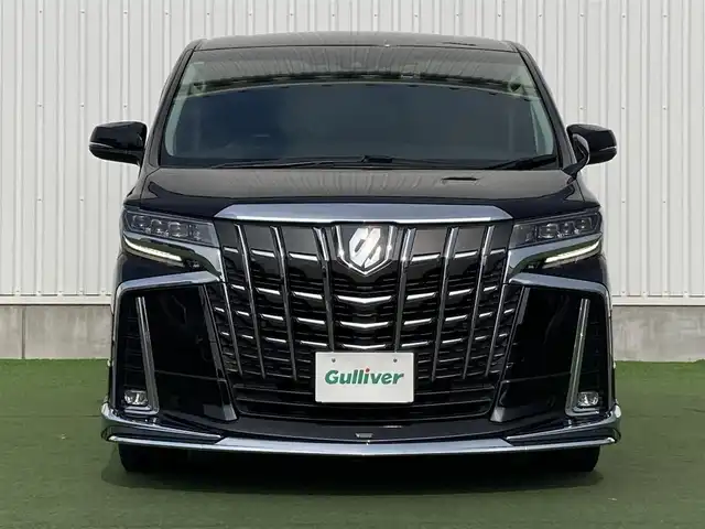 トヨタ アルファード S Cパッケージ 香川県 2020(令2)年 5.6万km ブラック 登録時走行距離：55455km/モデリスタエアロ/メーカー純正ナビ/　CD DVD BT フルセグTV/純正フリップダウンモニター（V12T-R68C）/バックカメラ/両側パワースライドドア/パワーバックドア/プリクラッシュセーフティシステム/レーンキープアシスト/レーダークルーズコントロール/クリアランスソナー/ブラインドスポットモニター/オートハイビーム/LEDヘッドライト/オートライト/フォグランプ/ブラックレザーシート/シートベンチレーション/オットマン/ロールサンシェード/前後ドライブレコーダー/ビルトインETC/デジタルインナーミラー/AC100V充電/木目革巻きコンビステアリング/ステアリングスイッチ/プッシュスタート/スマートキー
