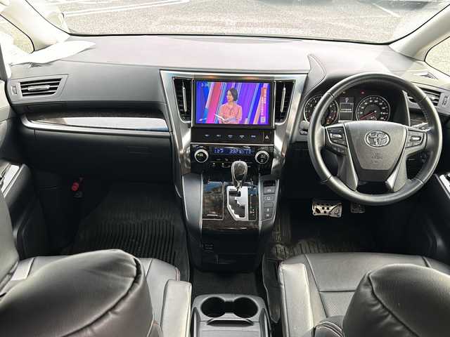 トヨタ ヴェルファイア Z 千葉県 2016(平28)年 1.5万km 黒 １０型ナビＮＳＺＮ－Ｚ６６Ｔ　バックカメラ　両側パワースライドドア　ＥＴＣ　革調シートカバー　スマートキー　プッシュスタート　１８インチアルミホイール　ＬＥＤライト　オートライト リアスポイラー/登録時走行距離:14718km/純正ナビ/純正フロアマット/レザーシートカバー/革巻きステアリング/ステアリングスイッチ/電動パーキングブレーキ/ブレーキホールド/ETC/スマートキ―/スペアキー/ドアバイザー/ウィンカーミラー