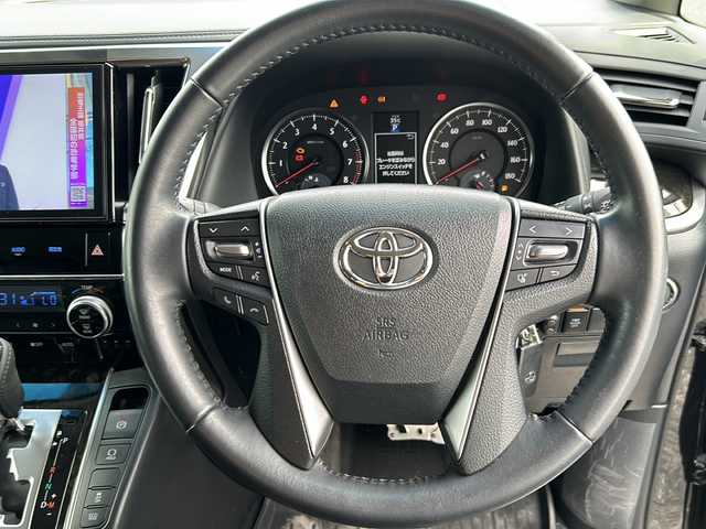 トヨタ ヴェルファイア Z 千葉県 2016(平28)年 1.5万km 黒 １０型ナビＮＳＺＮ－Ｚ６６Ｔ　バックカメラ　両側パワースライドドア　ＥＴＣ　革調シートカバー　スマートキー　プッシュスタート　１８インチアルミホイール　ＬＥＤライト　オートライト リアスポイラー/登録時走行距離:14718km/純正ナビ/純正フロアマット/レザーシートカバー/革巻きステアリング/ステアリングスイッチ/電動パーキングブレーキ/ブレーキホールド/ETC/スマートキ―/スペアキー/ドアバイザー/ウィンカーミラー