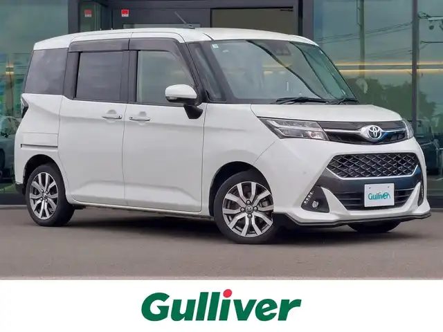 トヨタ タンク カスタムG－T 東京都 2020(令2)年 1.3万km パールホワイトⅢ スマートアシストIII/・衝突回避支援ブレーキ/・誤発進抑制制御/・車線逸脱警報機能/・先行車発進お知らせ機能/・クルーズコントロール/・コーナーセンサー/プッシュスタート/アイドリングストップ/社外ディスプレイオーディオ/バックカメラ/ETC/前後ドライブレコーダー VREC-DZ700D/両側パワースライドドア/後席ロールサンシェード/LEDヘッドライト/ドアバイザー/15インチ純正アルミホイール/スマートキー/純正エンジンスターター