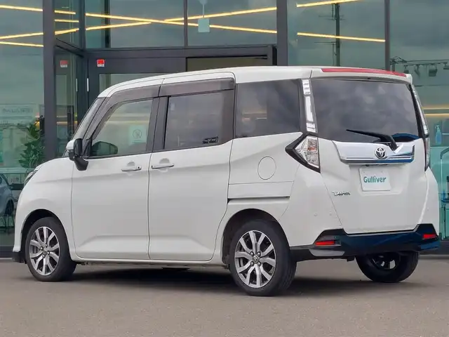 トヨタ タンク カスタムG－T 東京都 2020(令2)年 1.3万km パールホワイトⅢ スマートアシストIII/・衝突回避支援ブレーキ/・誤発進抑制制御/・車線逸脱警報機能/・先行車発進お知らせ機能/・クルーズコントロール/・コーナーセンサー/プッシュスタート/アイドリングストップ/社外ディスプレイオーディオ/バックカメラ/ETC/前後ドライブレコーダー VREC-DZ700D/両側パワースライドドア/後席ロールサンシェード/LEDヘッドライト/ドアバイザー/15インチ純正アルミホイール/スマートキー/純正エンジンスターター