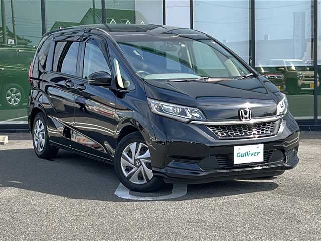ホンダ フリード ハイブリット G ホンダセンシング 岐阜県 2020(令2)年 6.8万km クリスタルブラックパール 登録時走行距離：67625km/純正ナビ/バックカメラ/フルセグテレビ・Bluetooth・CD・DVD再生可/両側パワースライドドア/レーダークルーズコントロール/レーンキープアシスト/プリクラッシュセーフティー/ETC/シートヒーター/LEDヘッドライト/フォグランプ/オートライト/ドライブレコーダー/純正フロアマット/保証書
