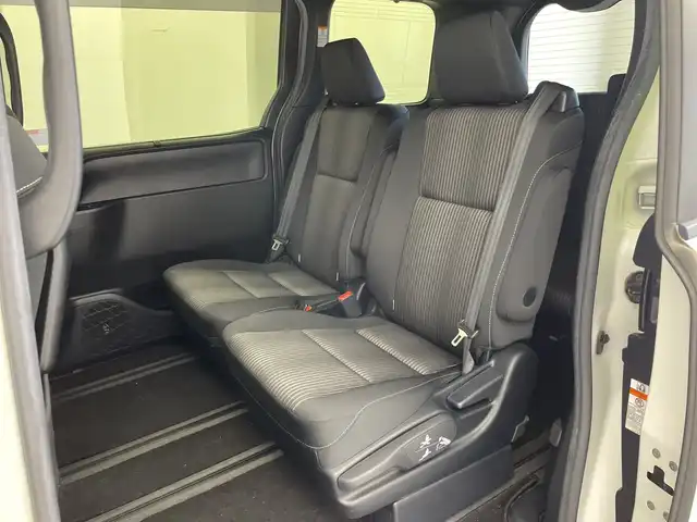 トヨタ ヴォクシー ZS 煌 新潟県 2019(平31)年 7.4万km ホワイトパールクリスタルシャイン 社外ナビ/バックカメラ/Bluetooth/CD/DVD/AUX/革巻きステアリング/HDMI/フルセグTV/ETC/両側パワースライドドア/ウォークスルー/LEDヘッドライト/プッシュスタート/スペアキー