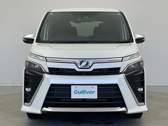 トヨタ ヴォクシー ZS 煌 新潟県 2019(平31)年 7.4万km ホワイトパールクリスタルシャイン 社外ナビ/バックカメラ/Bluetooth/CD/DVD/AUX/革巻きステアリング/HDMI/フルセグTV/ETC/両側パワースライドドア/ウォークスルー/LEDヘッドライト/プッシュスタート/スペアキー
