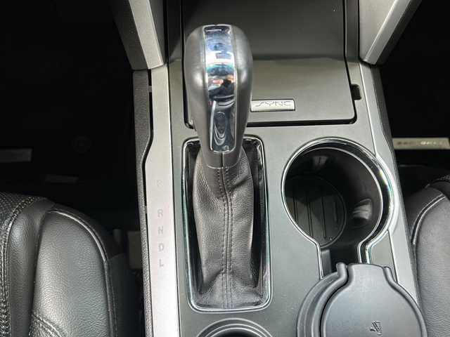 フォード エクスプローラー LTD エコブースト 鳥取県 2015(平27)年 5.1万km タキシード ブラック ディーラー車/左ハンドル/７人乗り/純正キーレス/サンルーフ/ブラックレザーシート/ＳＯＮＹサウンドシステム/ディスプレイオーディオ/社外ＨＤＤナビげーしょん/Bluetooth・DVD再生/バックカメラ・サイドフロントカメラ/ブラインドスポットモニタリング/バックソナー/トレーラースウェイ/トラクションコントロール/クルーズコントロール/パワーテールゲート/前席パワーシート（D席メモリ）/前席エアーシート（ヒーター）/ハンドルヒーター/３ゾーンエアコン/３列目電動格納シート/オートライト/ETCユニット/保証書・取説/記録簿R6/9R5/10R4/9R3/11R2/10/R1/10H30/9H29/9H28/3