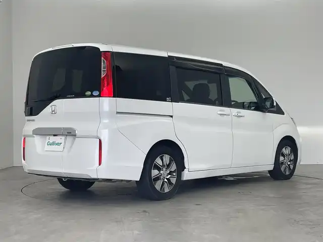 ホンダ ステップワゴン G EX 埼玉県 2015(平27)年 5.8万km ホワイトオーキッドパール 純正インターナビ/ CD DVD フルセグTV Bluetooth HDMI/11インチ純正フリップダウンモニター/バックカメラ/ステアリングスイッチ/衝突被害軽減システム/レーダークルーズコントロール/レーンキープアシスト/先行車発進お知らせ機能/横滑り防止システム/シートヒーター/わくわくゲート/LEDオートライト/ETC/スマートキー