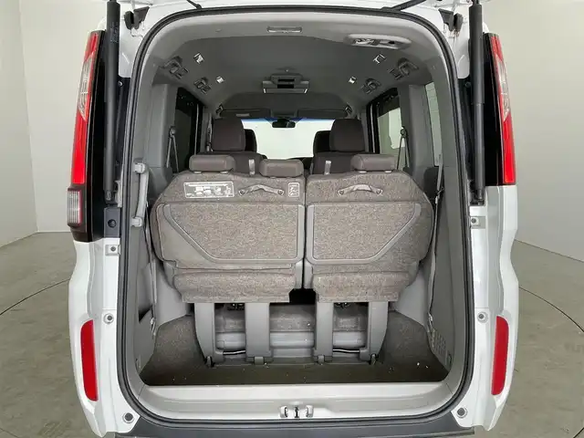 ホンダ ステップワゴン G EX 埼玉県 2015(平27)年 5.8万km ホワイトオーキッドパール 純正インターナビ/ CD DVD フルセグTV Bluetooth HDMI/11インチ純正フリップダウンモニター/バックカメラ/ステアリングスイッチ/衝突被害軽減システム/レーダークルーズコントロール/レーンキープアシスト/先行車発進お知らせ機能/横滑り防止システム/シートヒーター/わくわくゲート/LEDオートライト/ETC/スマートキー
