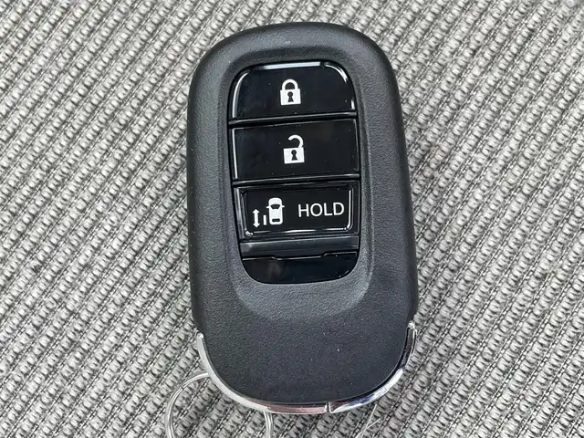 ホンダ Ｎ ＢＯＸ 佐賀県 2024(令6)年 0.7万km クリスタルブラックパール 純正8型ナビゲーション/・AM/FM/Bluetooth/CD/DVD/フルセグTV/・Apple Car Play/Android Auto/・バックカメラ/USB入力端子/前後録画ドライブレコーダー/片側パワースライドドア/LEDヘッドライト/・オートマチックハイビーム/プッシュスタート/スマートキー/ETC/純正フロアマット/純正ドアバイザー/新車保証書/取扱説明書/ホンダセンシング /レーダークルーズコントロール/コーナーセンサー/衝突被害軽減ブレーキ