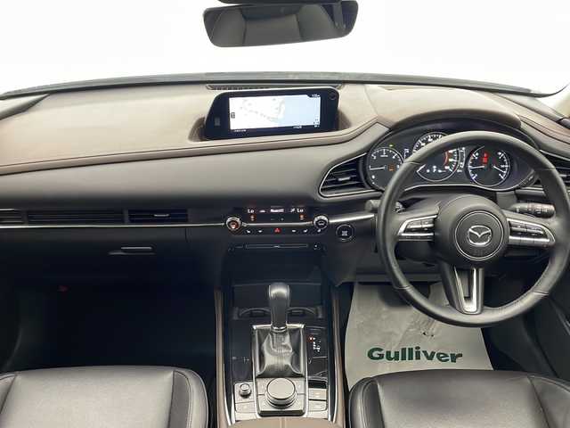 マツダ ＣＸ－３０ XD Lパッケージ 宮崎県 2020(令2)年 2.8万km スノーフレイクホワイトパールマイカ 禁煙車/衝突被害軽減ブレーキ/純正8.8型ディスプレイオーディオナビTV/（CD/DVD/Bluetooth/FMAM/フルセグTV)/純正バックカメラ/純正ETC/純正LEDオートライト/純正LEDフォグ/純正16インチアルミ/純正フロアマット/全方位モニター/茶本革シート/アダプティブクルーズコントロール/レーンディパーチャーアラート/ブラインドスポットモニター/クリアランスソナー/ヘッドアップディスプレイ/パワーバックドア/前席パワーシート/シートヒーター/ステアリングヒーター/本革巻ハンドル/パドルシフト/スマートキー/プッシュエンジンスタート/スペアキー/取扱い説明書/ナビ取扱い説明書