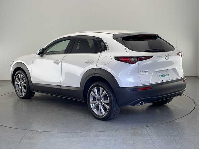 マツダ ＣＸ－３０ XD Lパッケージ 宮崎県 2020(令2)年 2.8万km スノーフレイクホワイトパールマイカ 禁煙車/衝突被害軽減ブレーキ/純正8.8型ディスプレイオーディオナビTV/（CD/DVD/Bluetooth/FMAM/フルセグTV)/純正バックカメラ/純正ETC/純正LEDオートライト/純正LEDフォグ/純正16インチアルミ/純正フロアマット/全方位モニター/茶本革シート/アダプティブクルーズコントロール/レーンディパーチャーアラート/ブラインドスポットモニター/クリアランスソナー/ヘッドアップディスプレイ/パワーバックドア/前席パワーシート/シートヒーター/ステアリングヒーター/本革巻ハンドル/パドルシフト/スマートキー/プッシュエンジンスタート/スペアキー/取扱い説明書/ナビ取扱い説明書