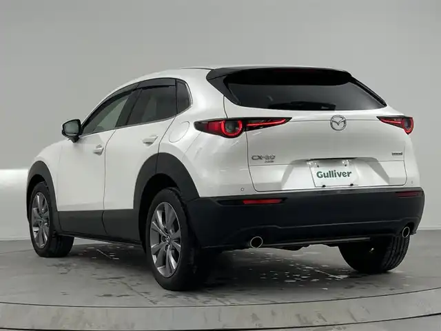マツダ ＣＸ－３０ XD Lパッケージ 熊本県 2020(令2)年 2.8万km スノーフレイクホワイトパールマイカ 禁煙車/衝突被害軽減ブレーキ/純正8.8型ディスプレイオーディオナビTV/（CD/DVD/Bluetooth/FMAM/フルセグTV)/純正バックカメラ/純正ETC/純正LEDオートライト/純正LEDフォグ/純正16インチアルミ/純正フロアマット/全方位モニター/茶本革シート/アダプティブクルーズコントロール/レーンディパーチャーアラート/ブラインドスポットモニター/クリアランスソナー/ヘッドアップディスプレイ/パワーバックドア/前席パワーシート/シートヒーター/ステアリングヒーター/本革巻ハンドル/パドルシフト/スマートキー/プッシュエンジンスタート/スペアキー/取扱い説明書/ナビ取扱い説明書